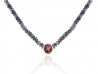 Cianita stone necklace with golden mouth and pink tourmaline stone.