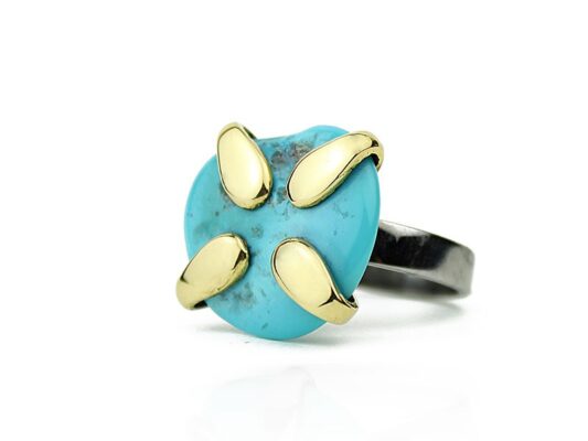 Silver and yellow gold ring with natural turquoise.