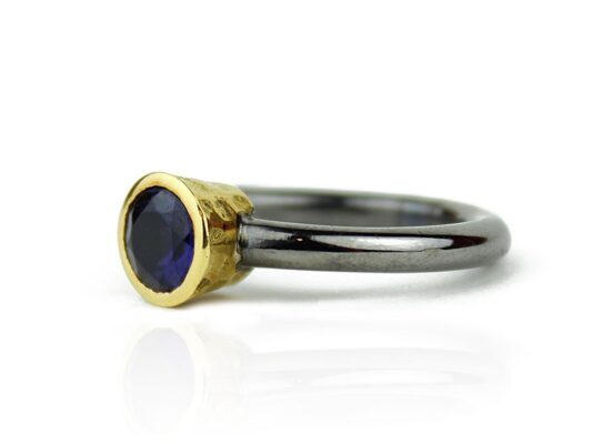 Silver and yellow gold ring with iolite.