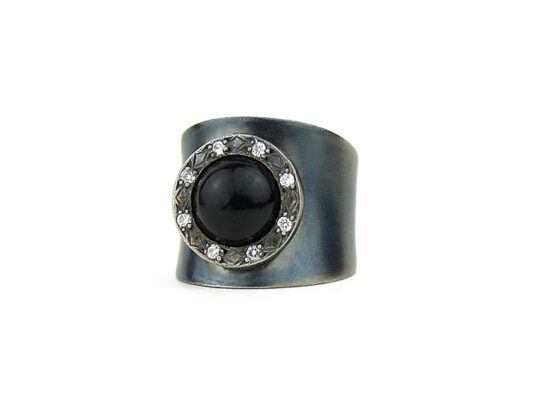 Silver, diamond and onyx ring.
