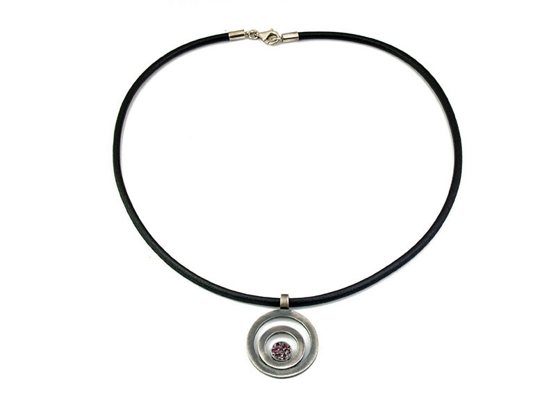 Matte oxidized silver pendant with natural Rubies and leather with silver clasp. Matte oxidized silver pendant with natural Rubies and leather with silver clasp.