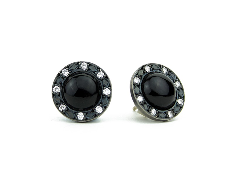 Silver, onyx and white diamond earrings. Silver, onyx and white diamond earrings.