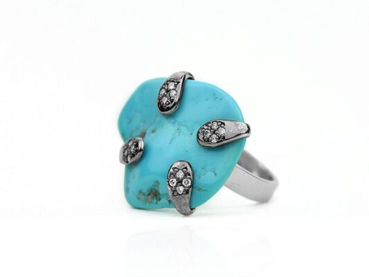 Silver ring with natural turquoise and diamonds.