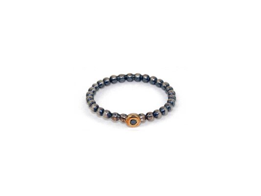 Anillo de plata, oro y brillante negro.