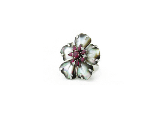 White gold ring, grey mother-of-pearl flower, rubies and diamonds.