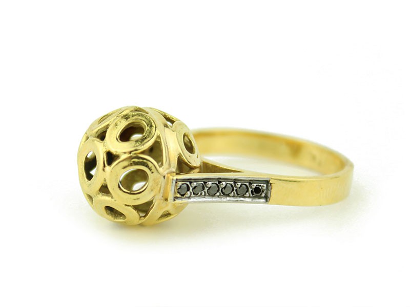 Gold ring with black diamonds. Gold ring with black diamonds.