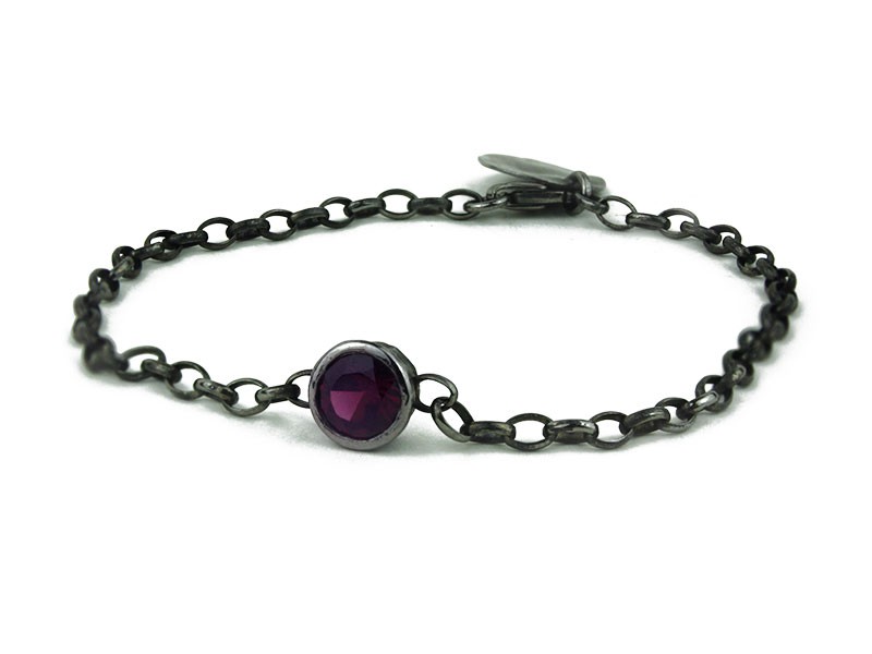 Silver bracelet with garnet and plaque. Silver bracelet with garnet and plaque.