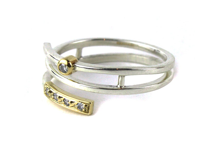 Spiral silver ring with diamonds. Spiral silver ring with diamonds.