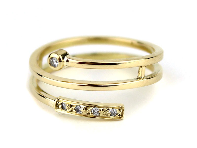 Spiral gold ring with diamonds. Spiral gold ring with diamonds.