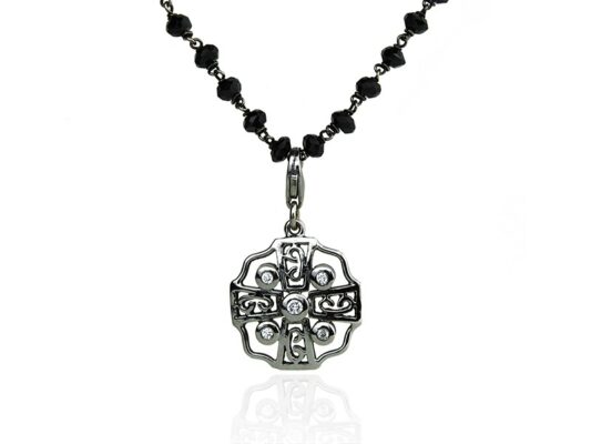 Gold pendant with diamonds.