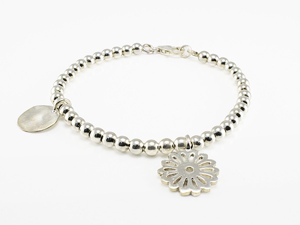 Rigid silver bracelet with small beads. Rigid silver bracelet with small beads.