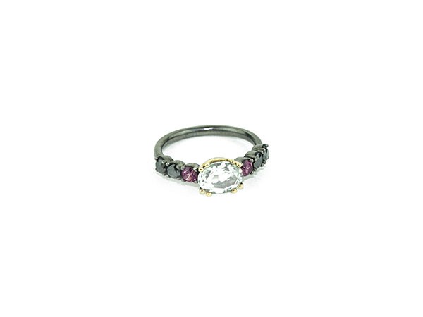 Silver and yellow gold ring with green Amethyst, Rhodolite and black Brilliant. Silver and yellow gold ring with green Amethyst, Rhodolite and black Brilliant.