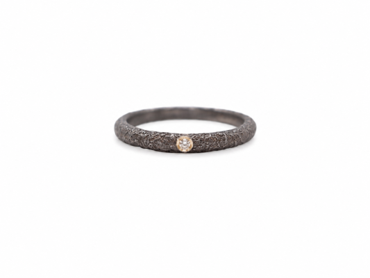 Oxidized and shiny silver ring.