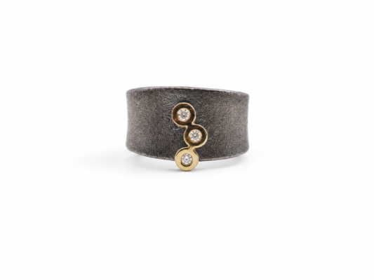 Oxidized silver ring, yellow gold and lab-created diamonds.