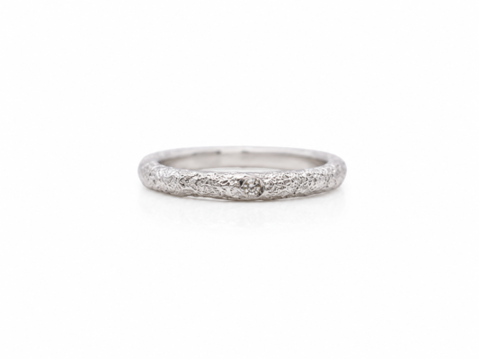 Silver and diamond ring.