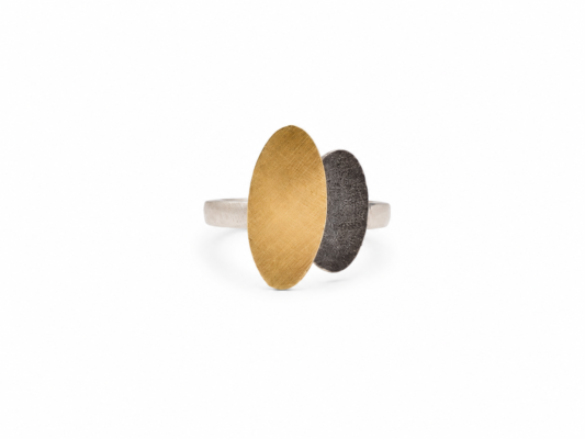 Silver and yellow gold ring.