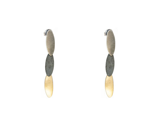 Silver and yellow gold earring.