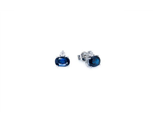 White gold earrings with blue sapphire and diamond.