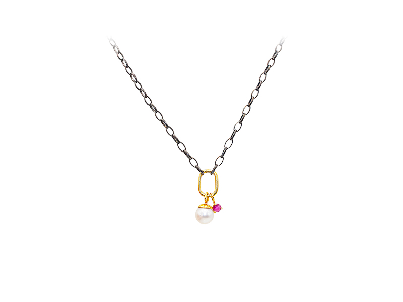 Oxidized silver chain with yellow gold clasp with pearl and ruby pendants. Oxidized silver chain with yellow gold clasp with pearl and ruby pendants.