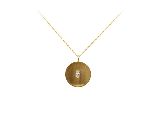 Yellow gold chain and pendant with marquise cut diamond.