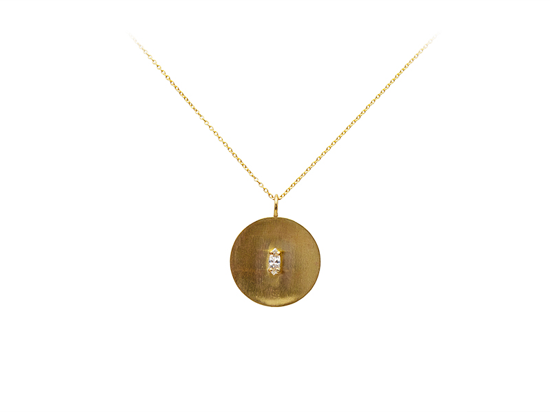 Yellow gold chain and pendant with marquise cut diamond. Yellow gold chain and pendant with marquise cut diamond.