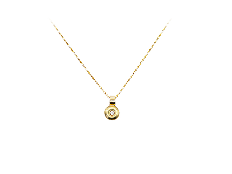 Yellow gold chain and pendant with a diamond. Yellow gold chain and pendant with a diamond.